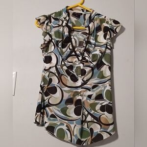 Takara brand ladies sleeveless top. Size large